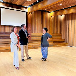 Sheila Malcolmson, MLA for Nanaimo, Richard Horbachewski and Lillian Morton tour the gathering space inside Shq’apthut