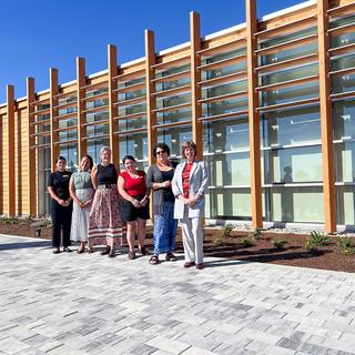 Sheila Malcolmson, MLA for Nanaimo and staff pose outside of Shq’apthut