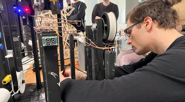 Engineering students adjust their designs