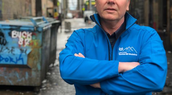 Chris Gill in an alleyway