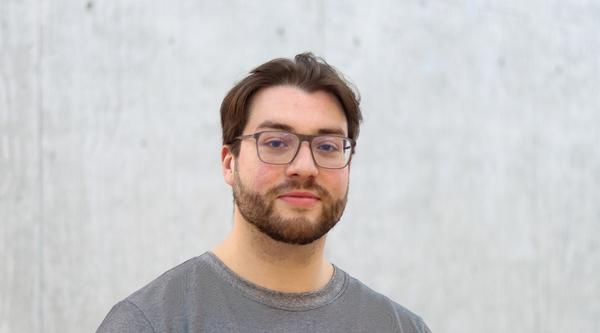 Headshot of Mac Barrera.