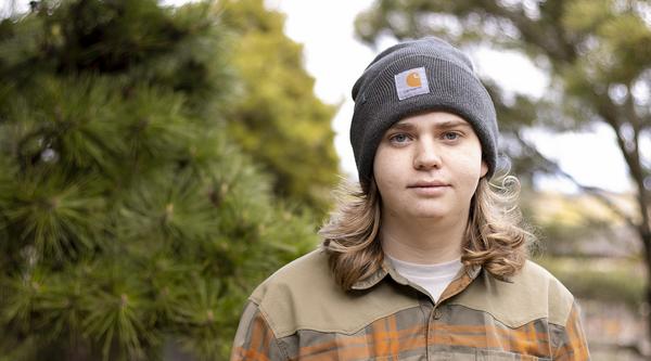 Marcel Du Pleissis stands in a garden area at VIU's Nanaimo campus.