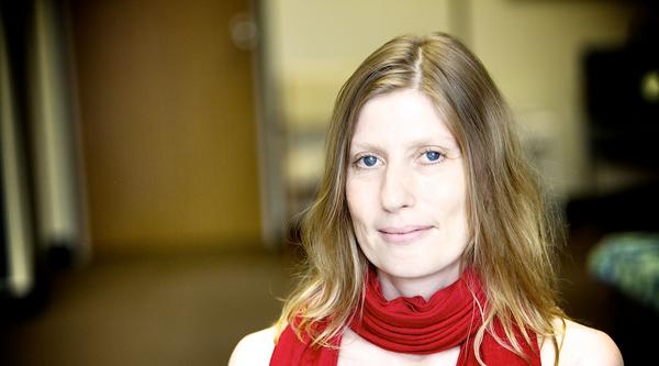 Samantha Letourneau closeup, wearing a red scarf