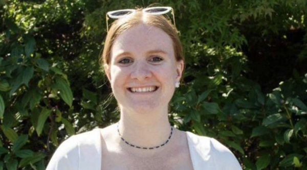 Victoria Koutstaal outside on a sunny day smiling at the camera.