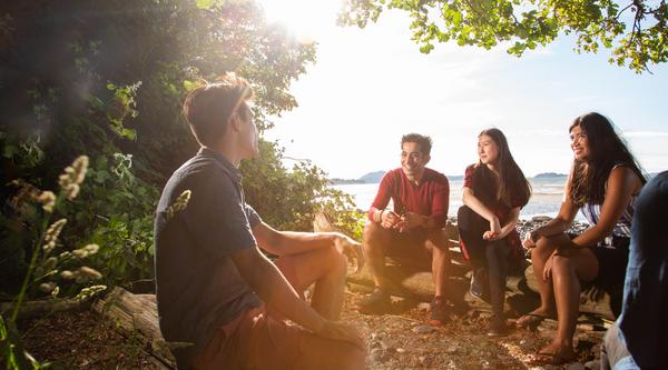Students in a group at the beach