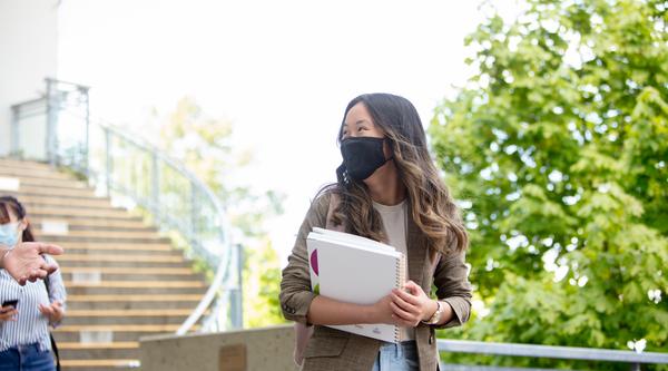 VIU students wearing mask by the library