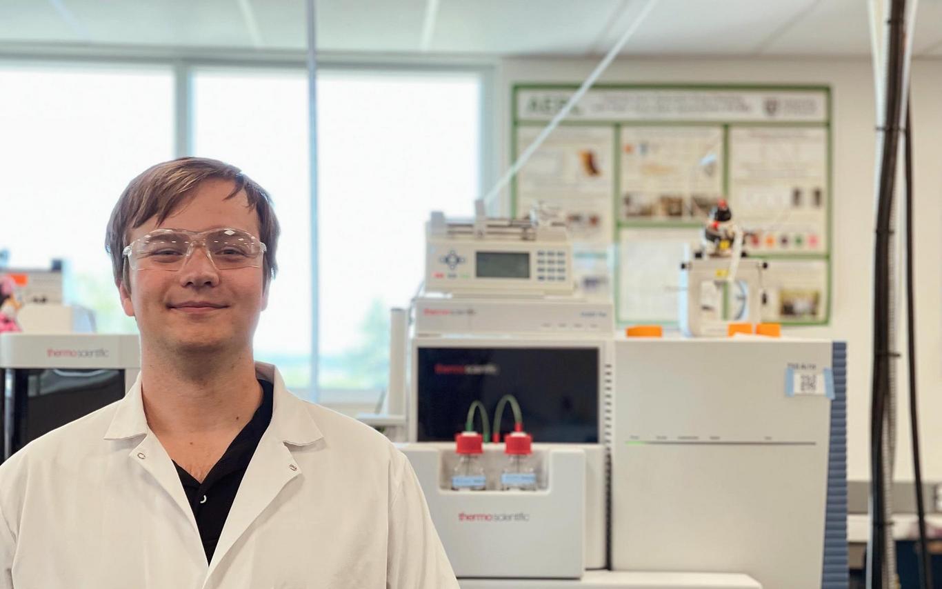 Jindar Sboto smiles while working in a VIU Chemistry lab.
