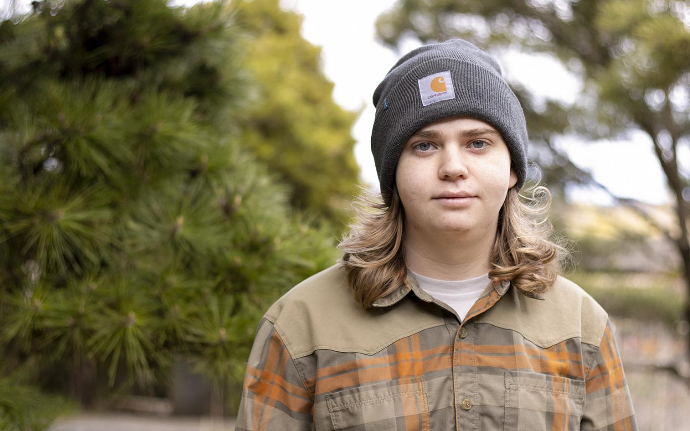 Marcel Du Pleissis stands in a garden area at VIU's Nanaimo campus.