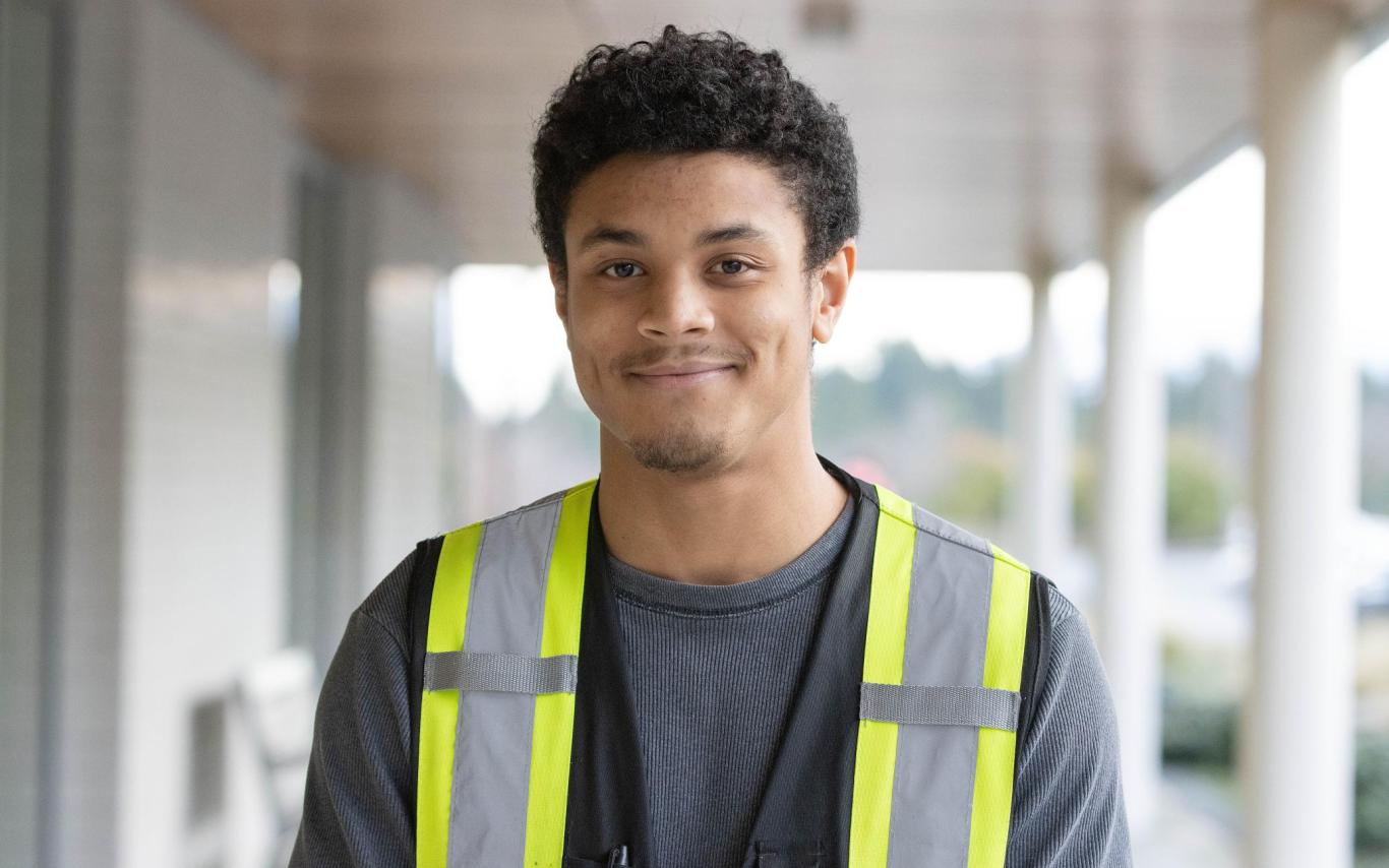 Mike de Vries portrait photo wearing an electrical vest