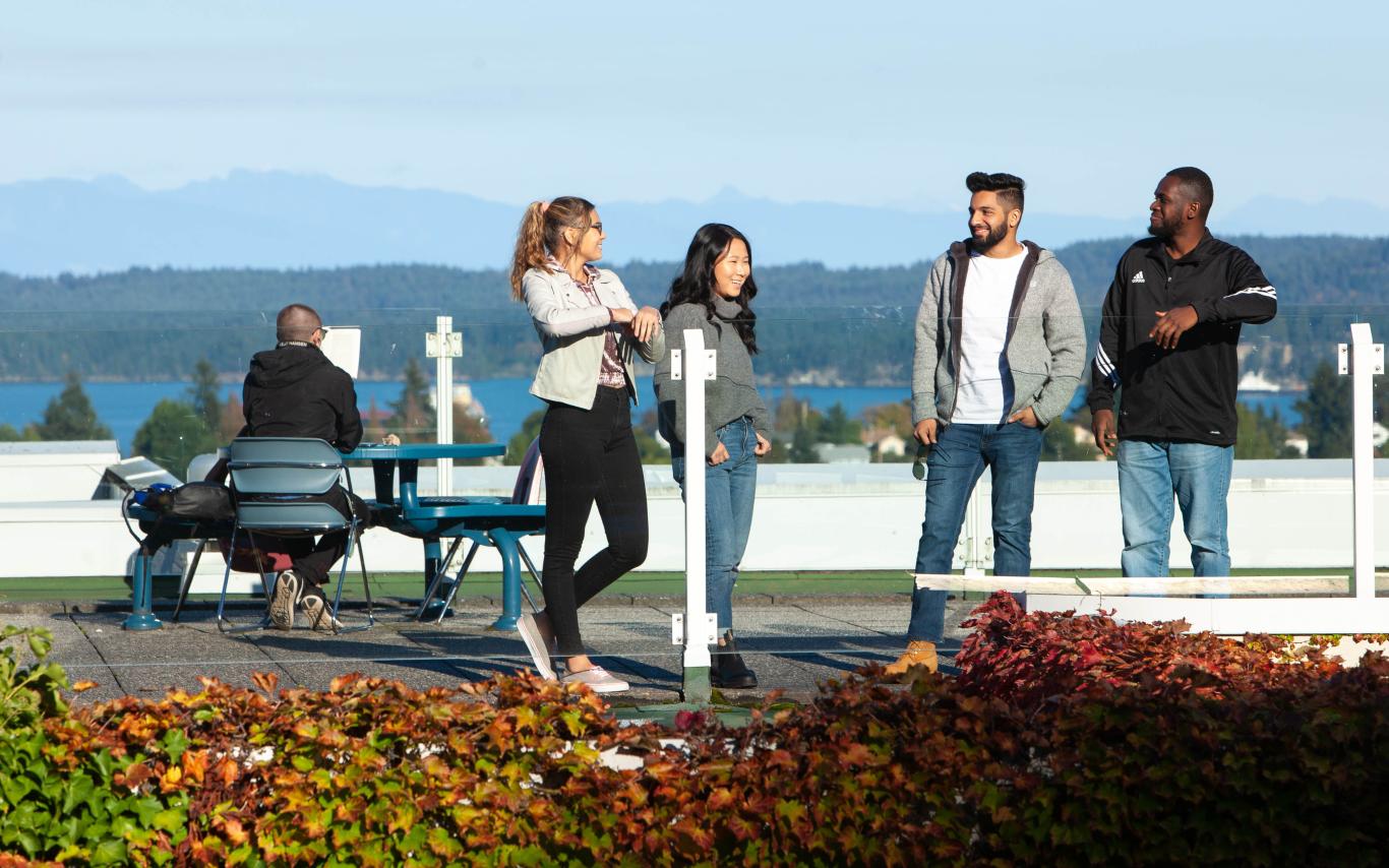 Students chatting on the roof of Building 300, VIU Nanaimo campus