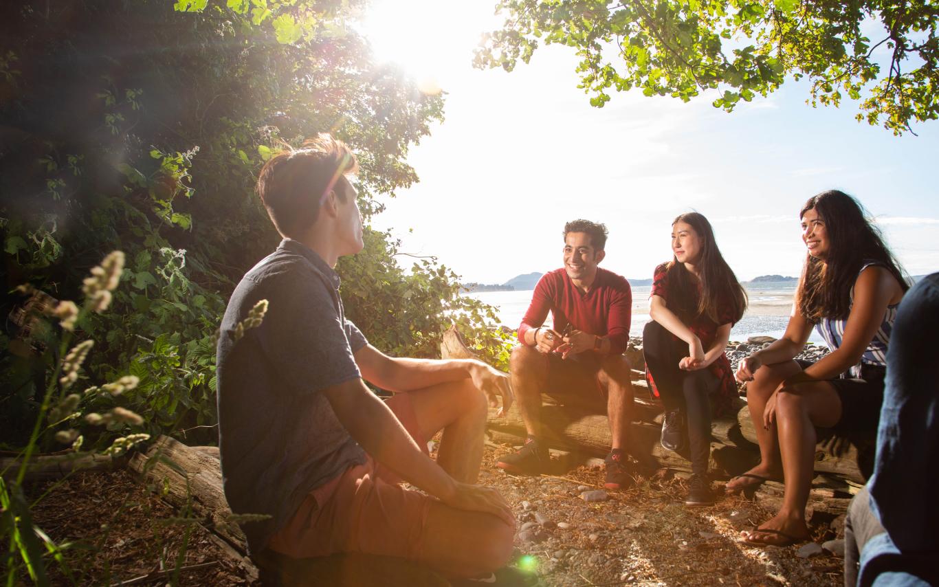 Students in a group at the beach