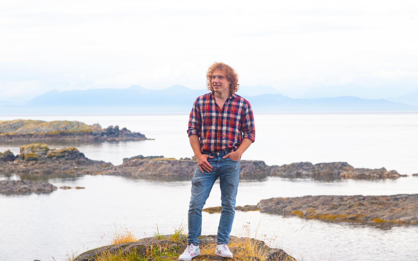 Ted with the ocean behind him